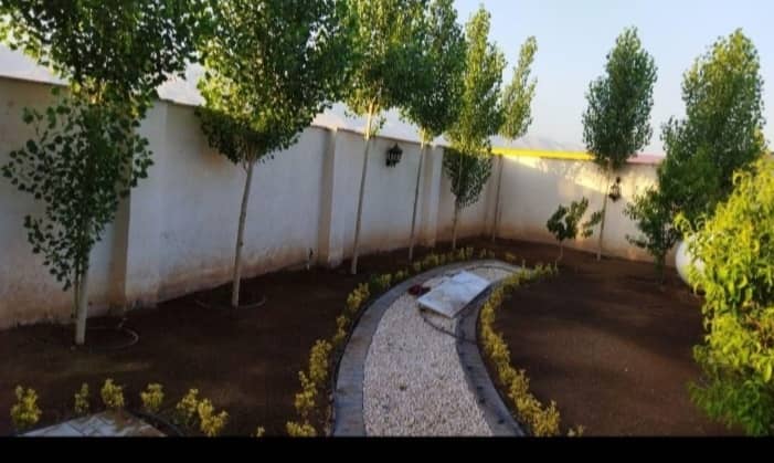 محوطه‌سازی و کاشت در محوطه ویلایی